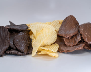 Chocolate covered potato chips close up